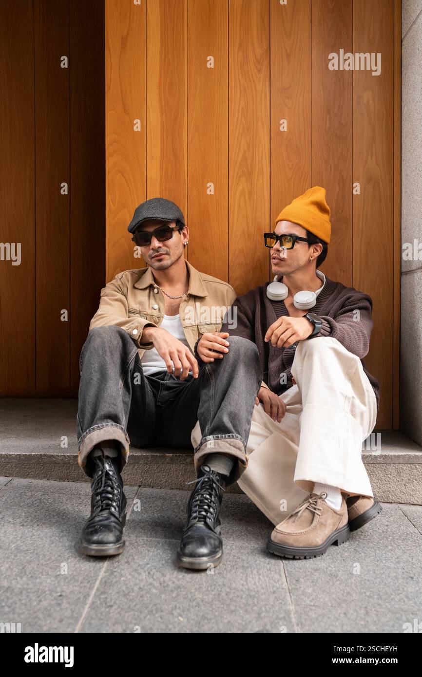 Two men back hats hi-res stock photography and images - Alamy
