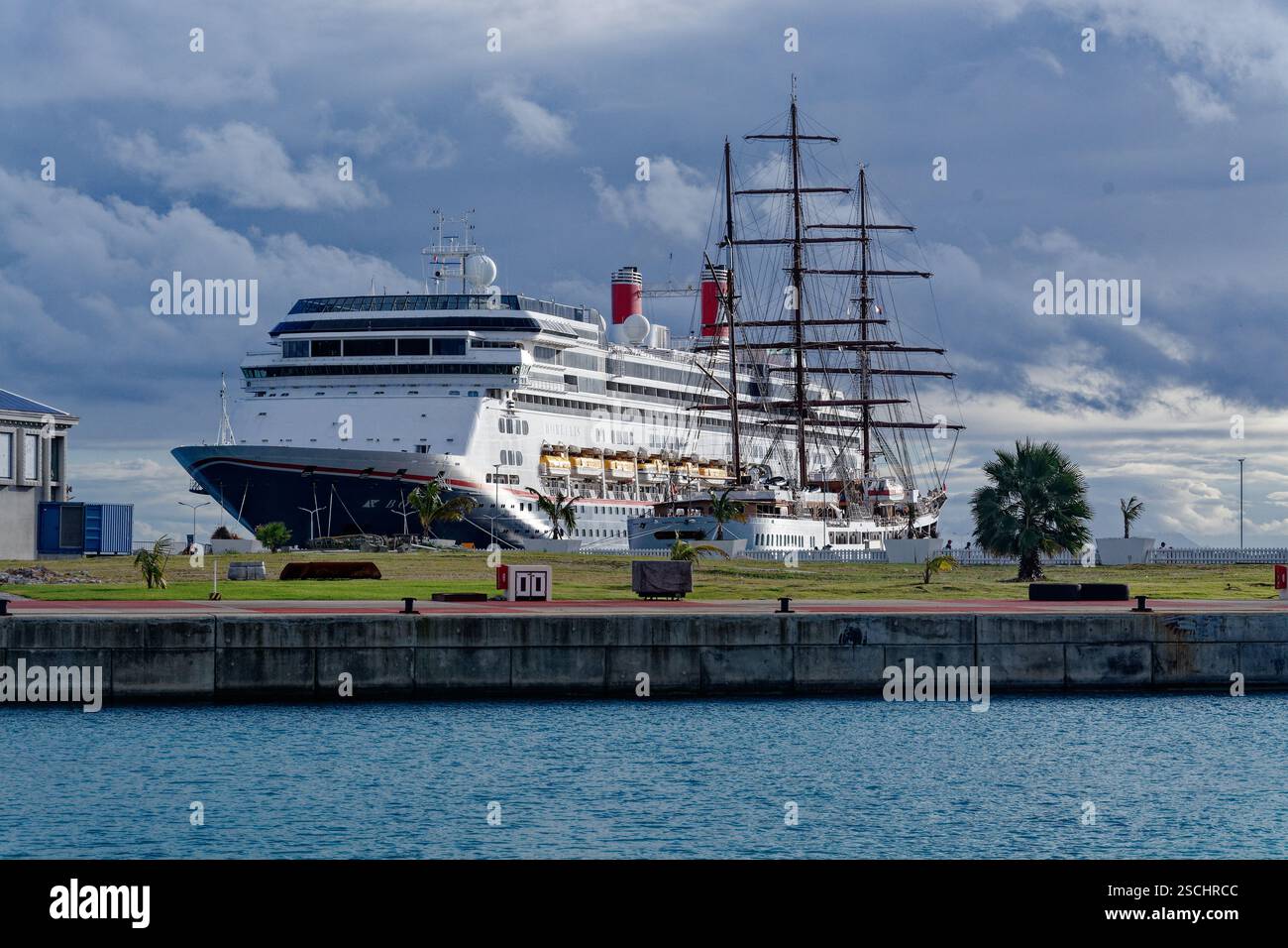 Cruise Ship and Sailing Ship berthed next to each other in Philipsburg ...
