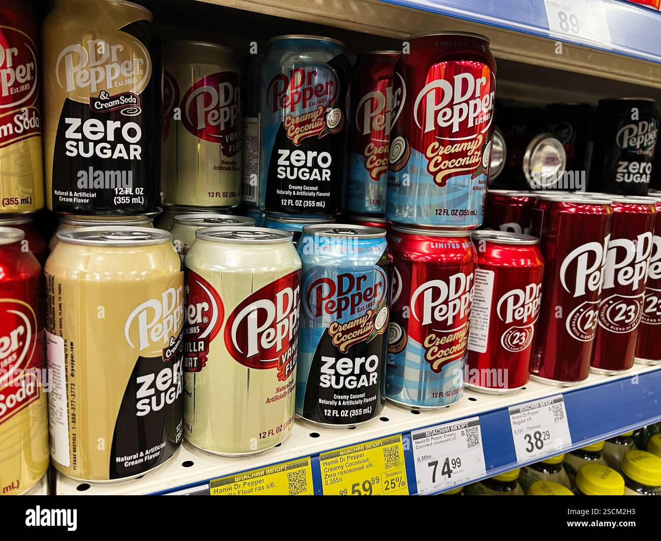 Kyiv Ukraine February 04 2025 Cans Of Various Dr Pepper Soda Kyiv Ukraine February 04 2025 Cans Of Various Dr Pepper Soda Flavors Neatly Arranged On A Store Shelf 2SCM2H3