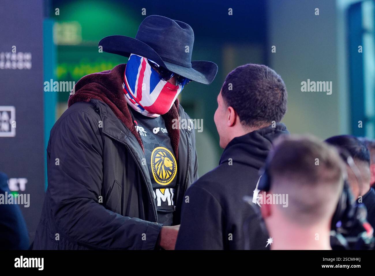 Derek Chisora and Delicious Orie (right) during the weigh-in at the ...