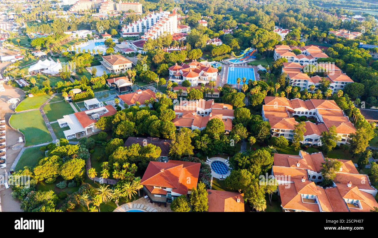 Aerial view of a luxury resort with private villas, lush gardens, and ... - Luxury Resort Apartment With Private View