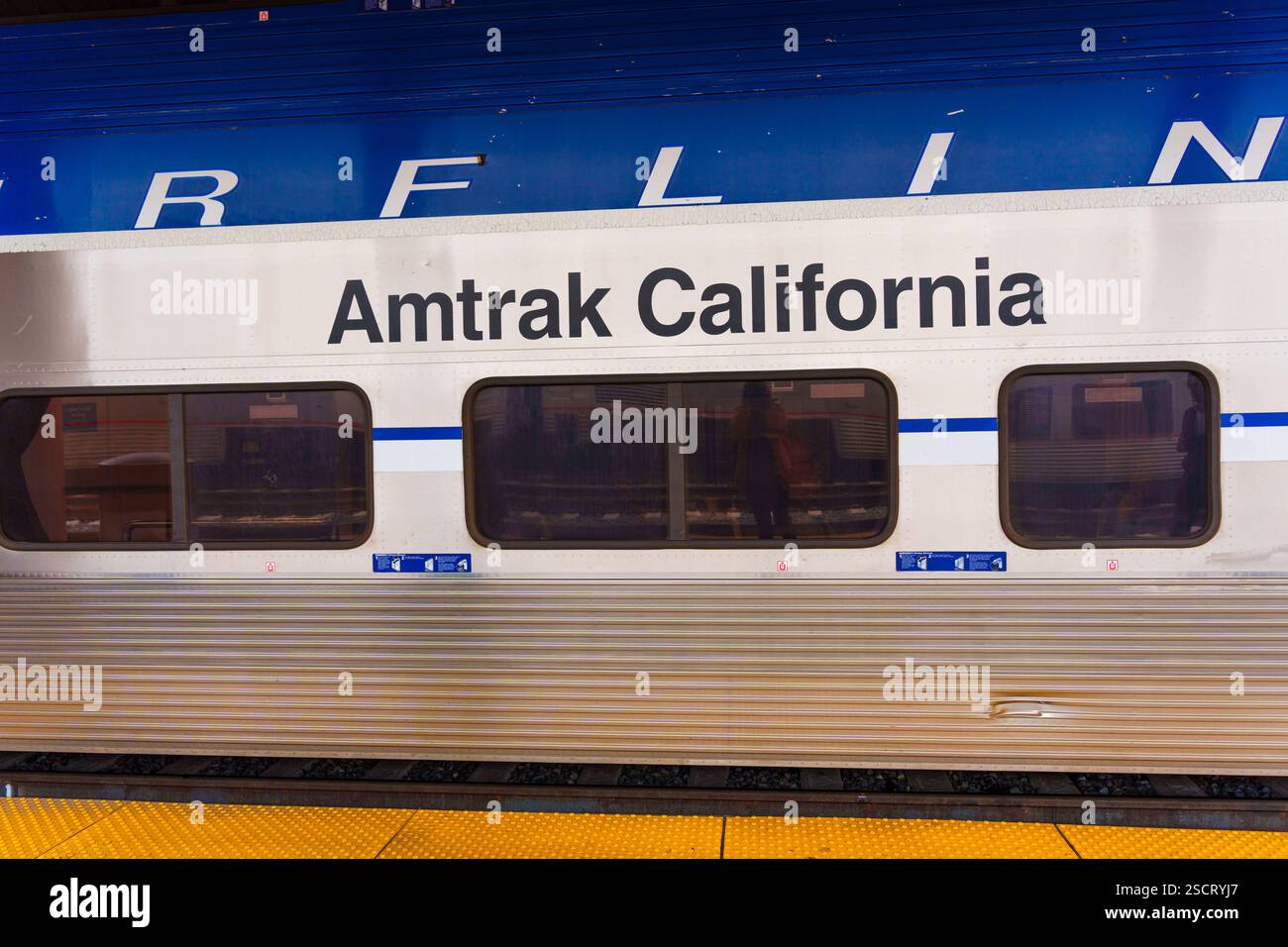 Los Angeles, California - December 30, 2024: Detail of Amtrak California train car showcasing branding at Los Angeles station. Stock Photo