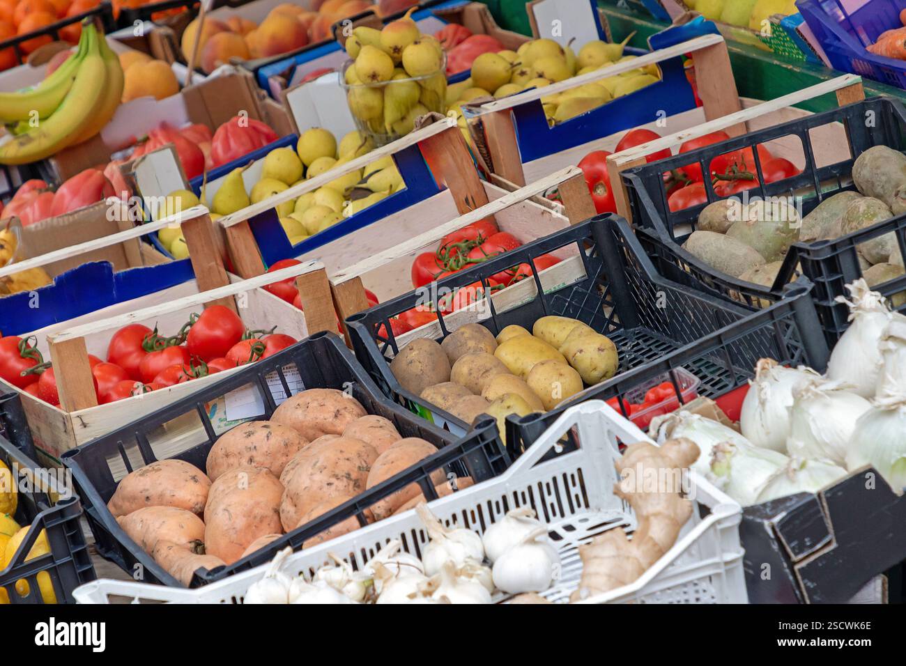 Fresh raw organic vegetables sold outside on a market stall Stock Photo ...