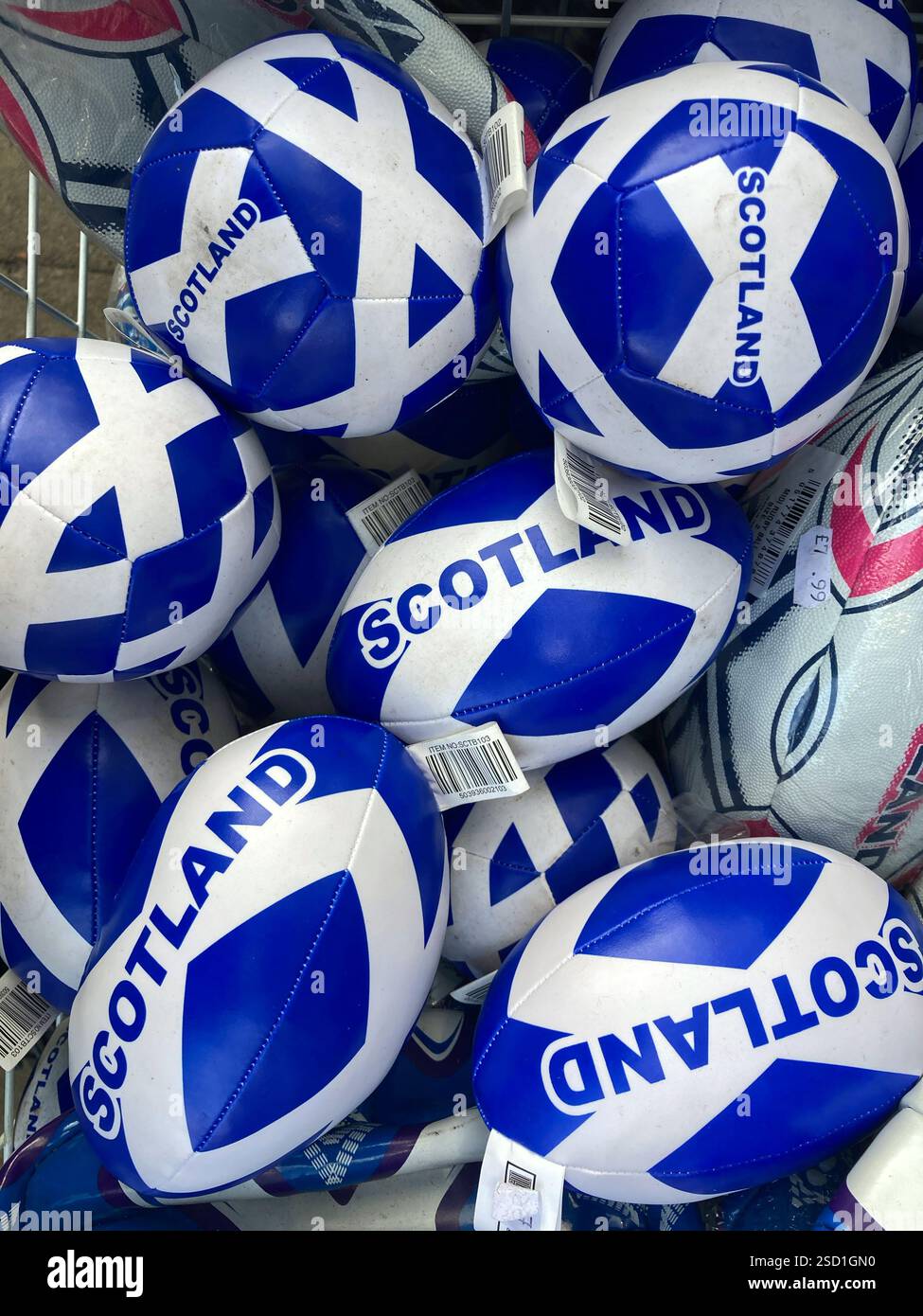 Gift shop selling soft toy rugby balls and footballs with Scottish Saltire design, Edinburgh Scotland - Smartphone Captured Stock Image