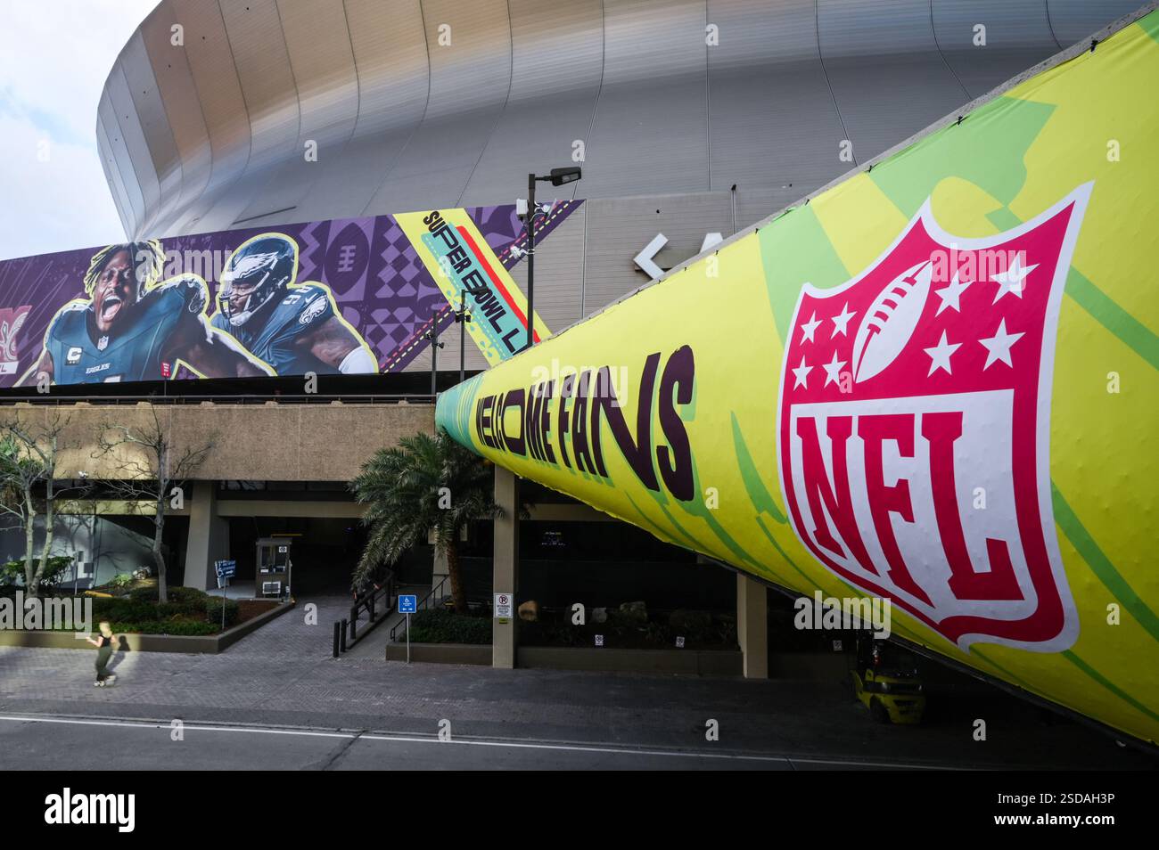 The Caesars Superdome is decorated with Super Bowl LIX decals in New ...