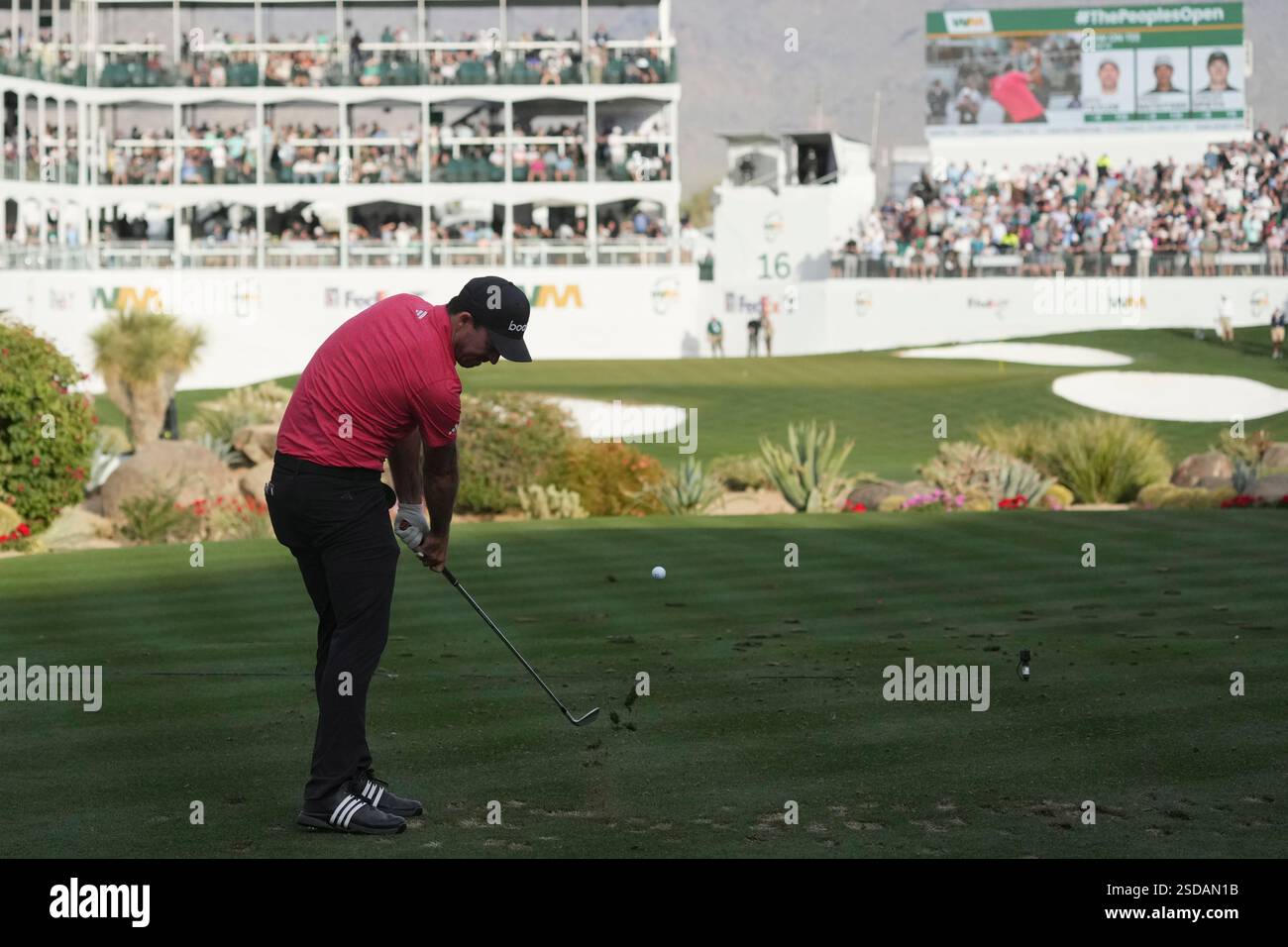 Nick Taylor, of Canada, hits his tee shot at the 16th hole during the