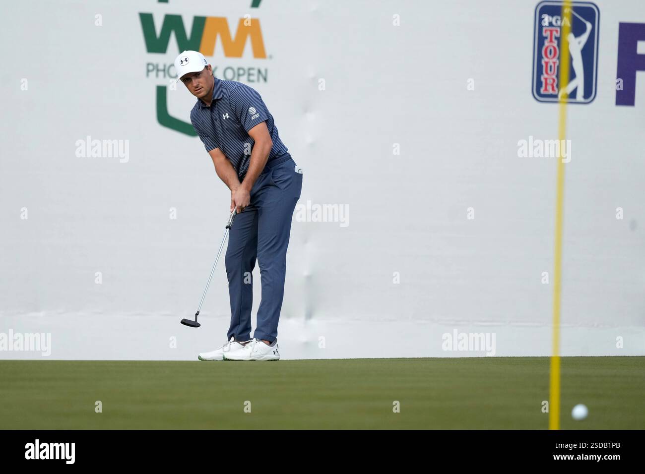 Jordan Spieth leaves his first putt short at the 16th hole during the