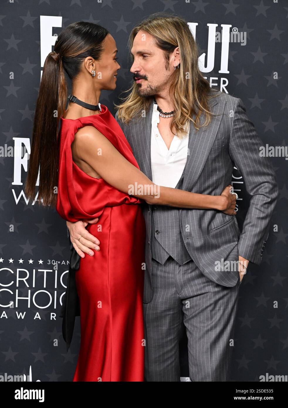 Santa Monica, USA. 07th Feb, 2025. Zoe Saldana and Marco Perego ...