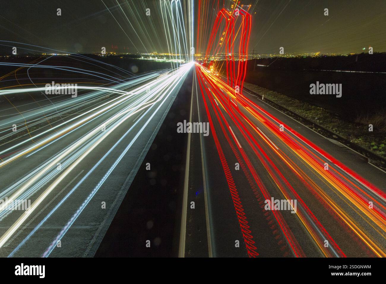 A7 Motorway, Autobahn, beside Kassel at night with light trails from the traffic headlights and taillights, an abstract image, Hesse, Germany, Europe Stock Photo