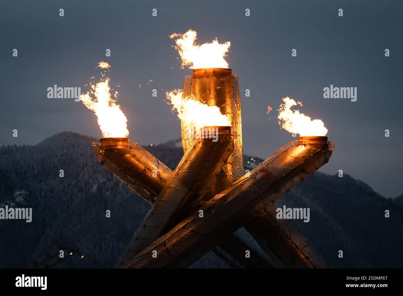 The Olympic Cauldron at Jack Poole Plaza in Vancouver is lit in ...