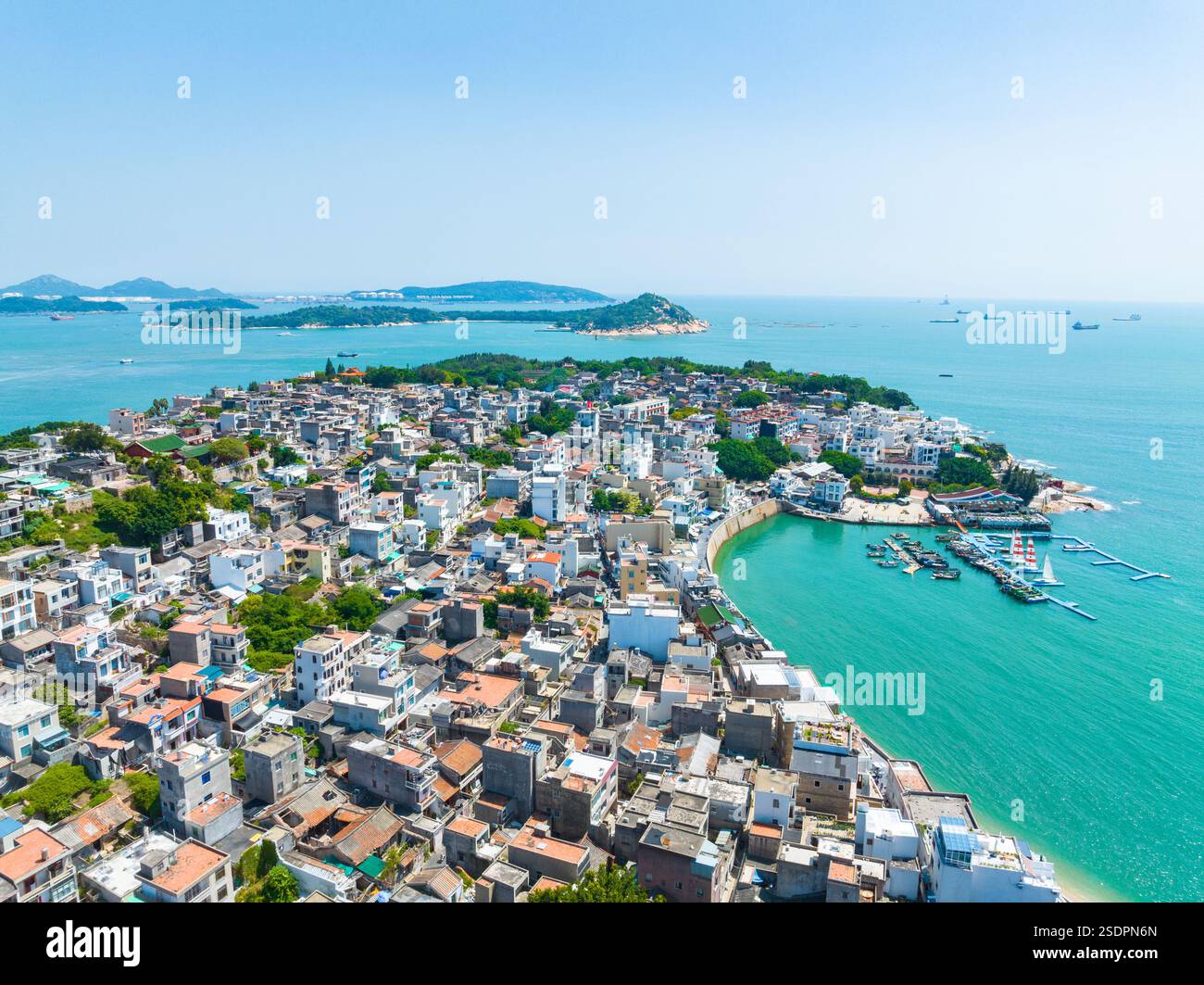 Aerial View of Coastal City with Blue Ocean and Sandy Beaches Stock ...