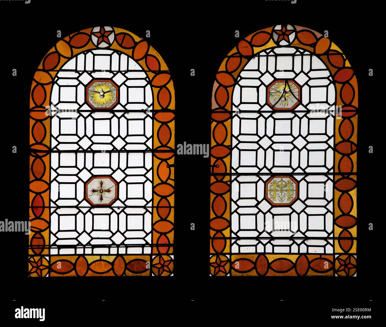 Stained glass windows at Chambord castle showcase colorful patterns and ...