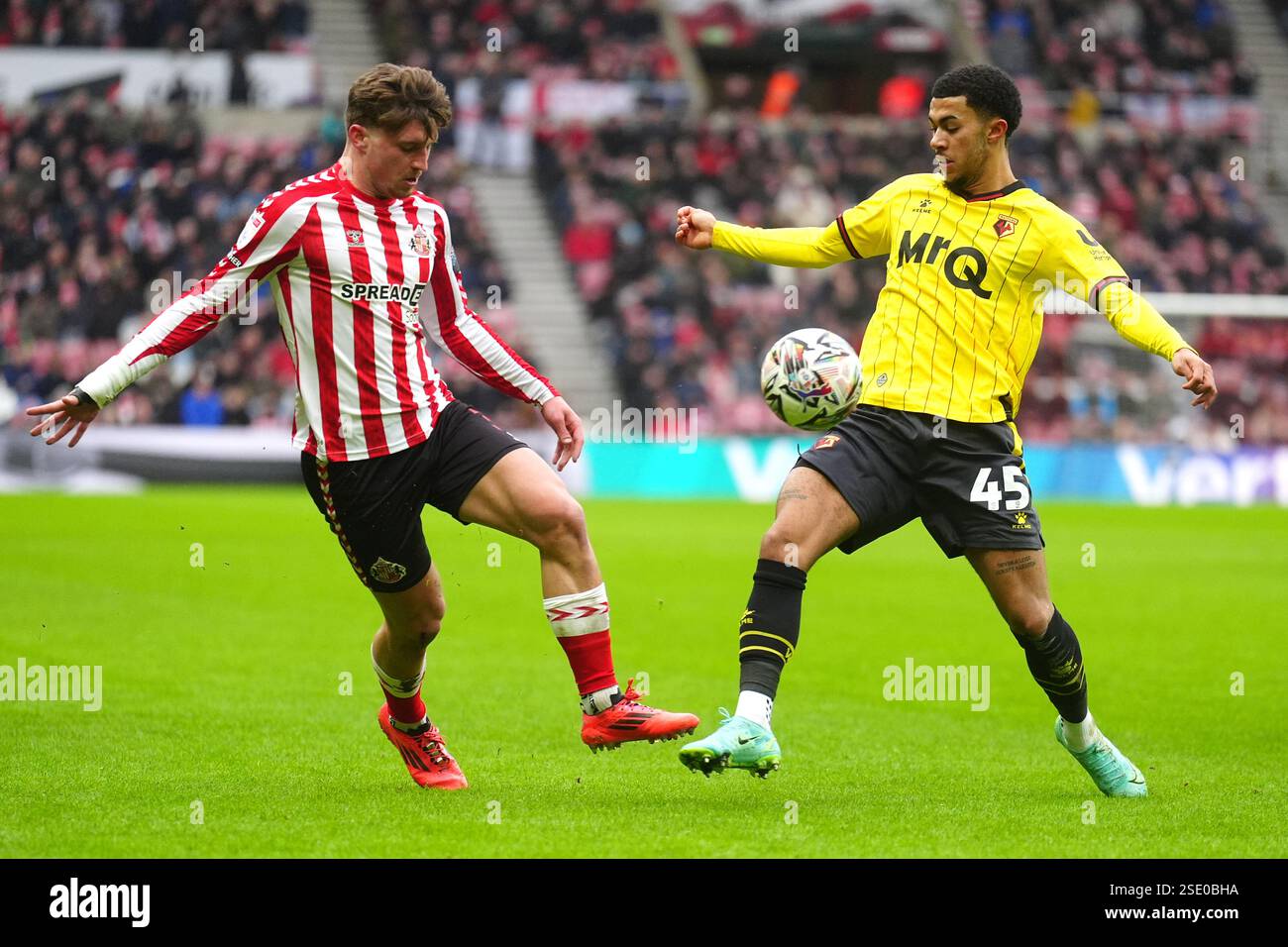 Sunderland's Dennis Cirkin (left) and Watford's Ryan Andrews battle for