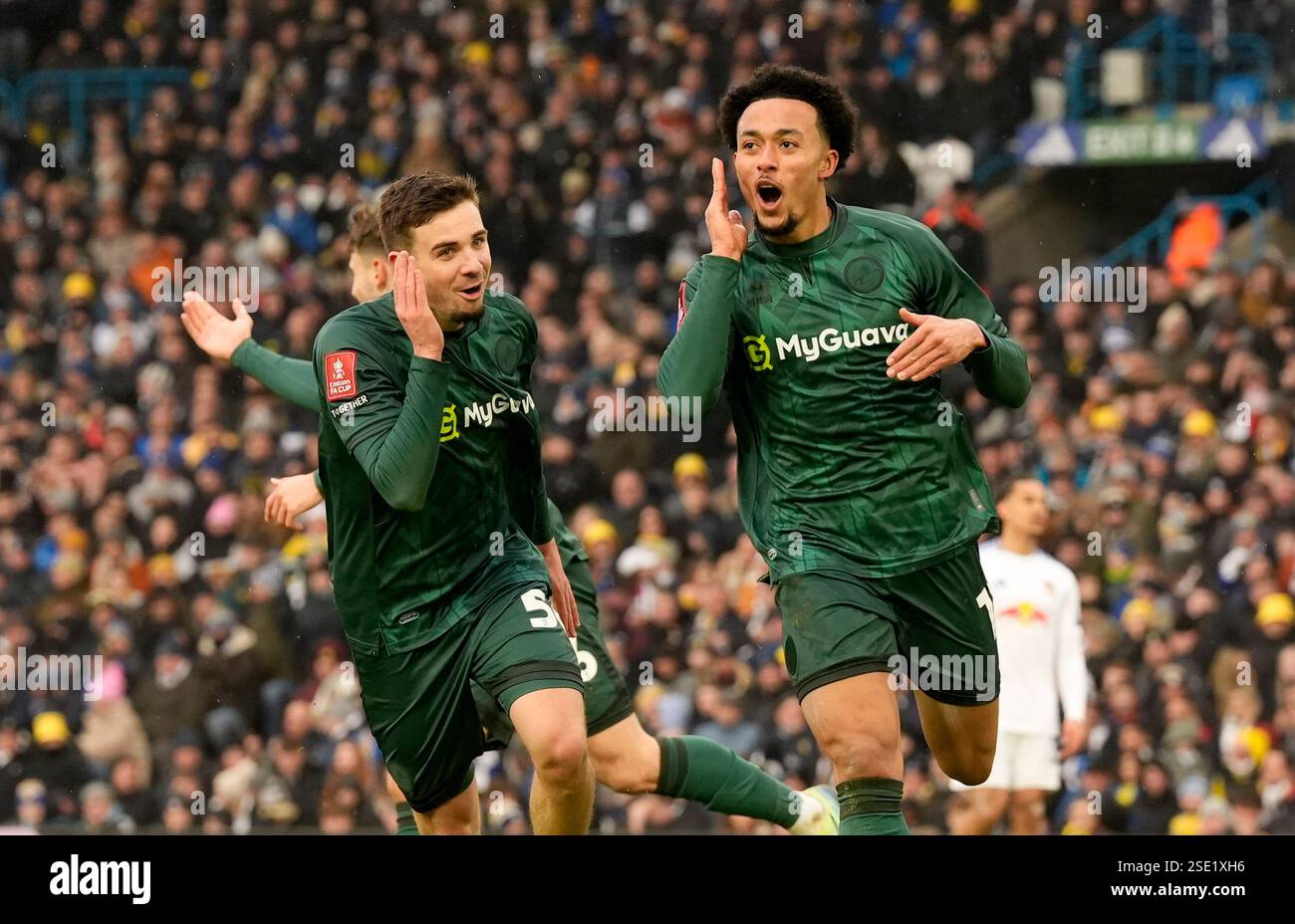 Millwall's Femi Azeez (right) celebrates after scoring his sides second ...