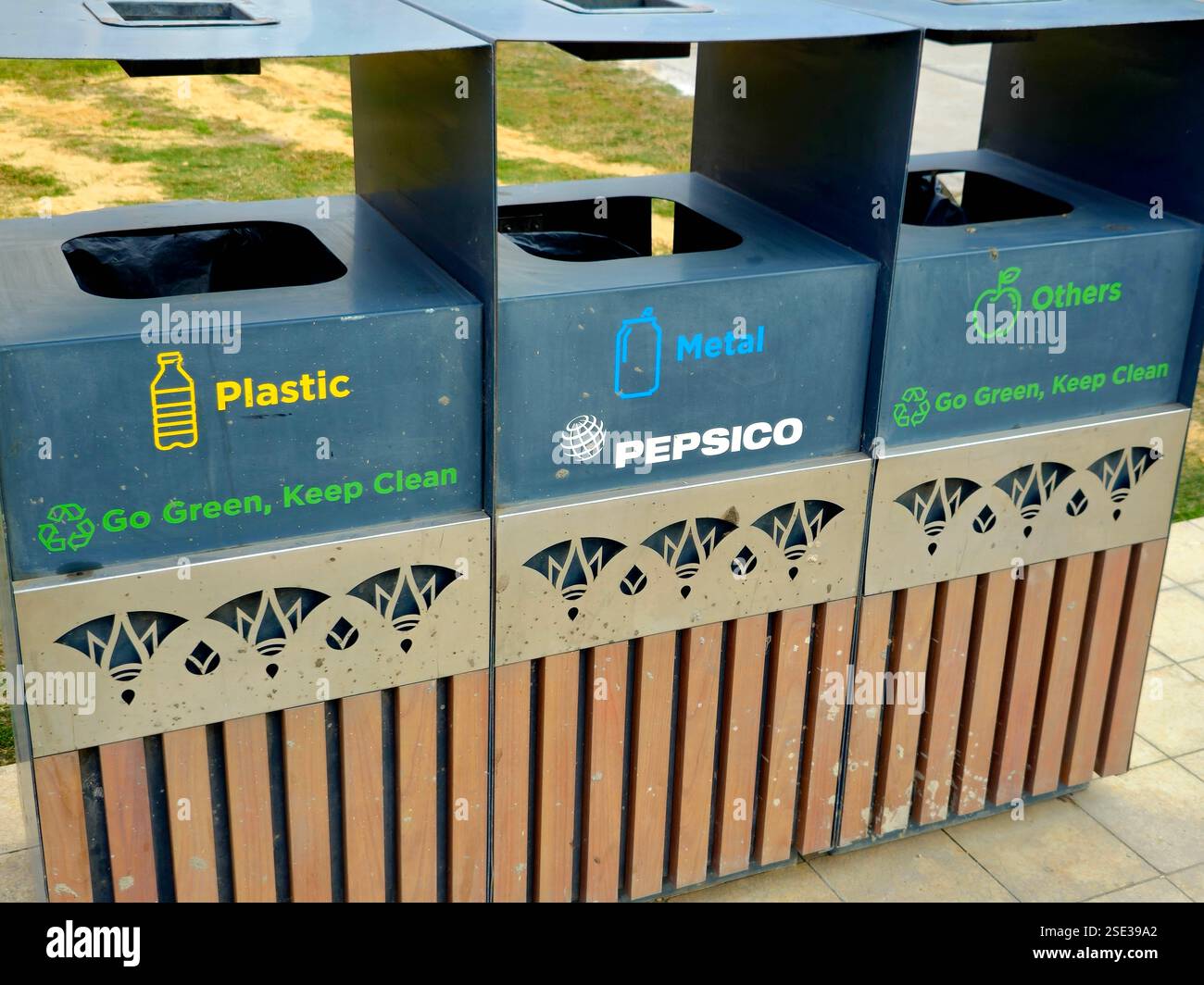 Cairo, Egypt, February 1 2025: Wooden trash bin for different garbage ...