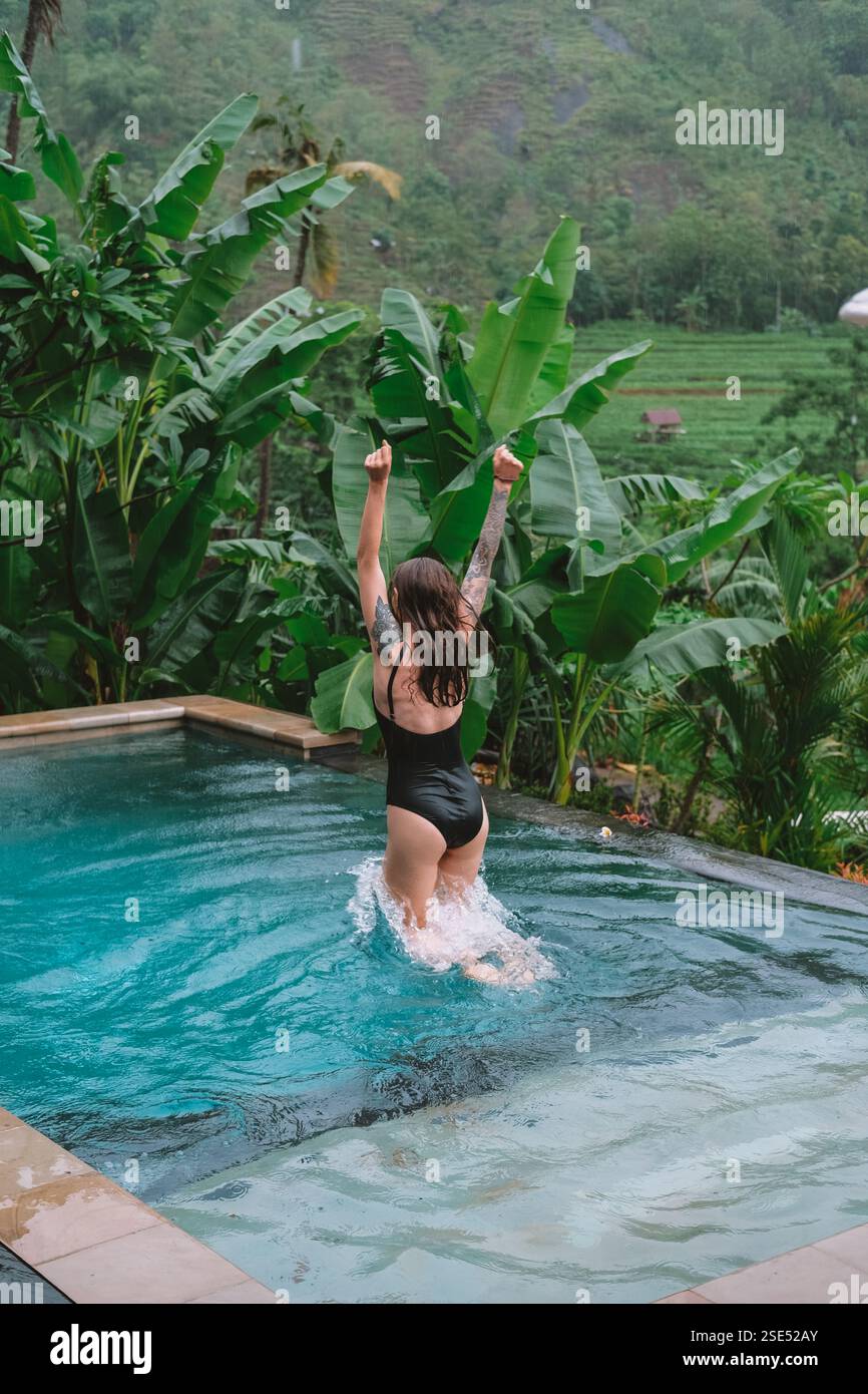 Medium shot woman in tropical hi-res stock photography and images - Alamy