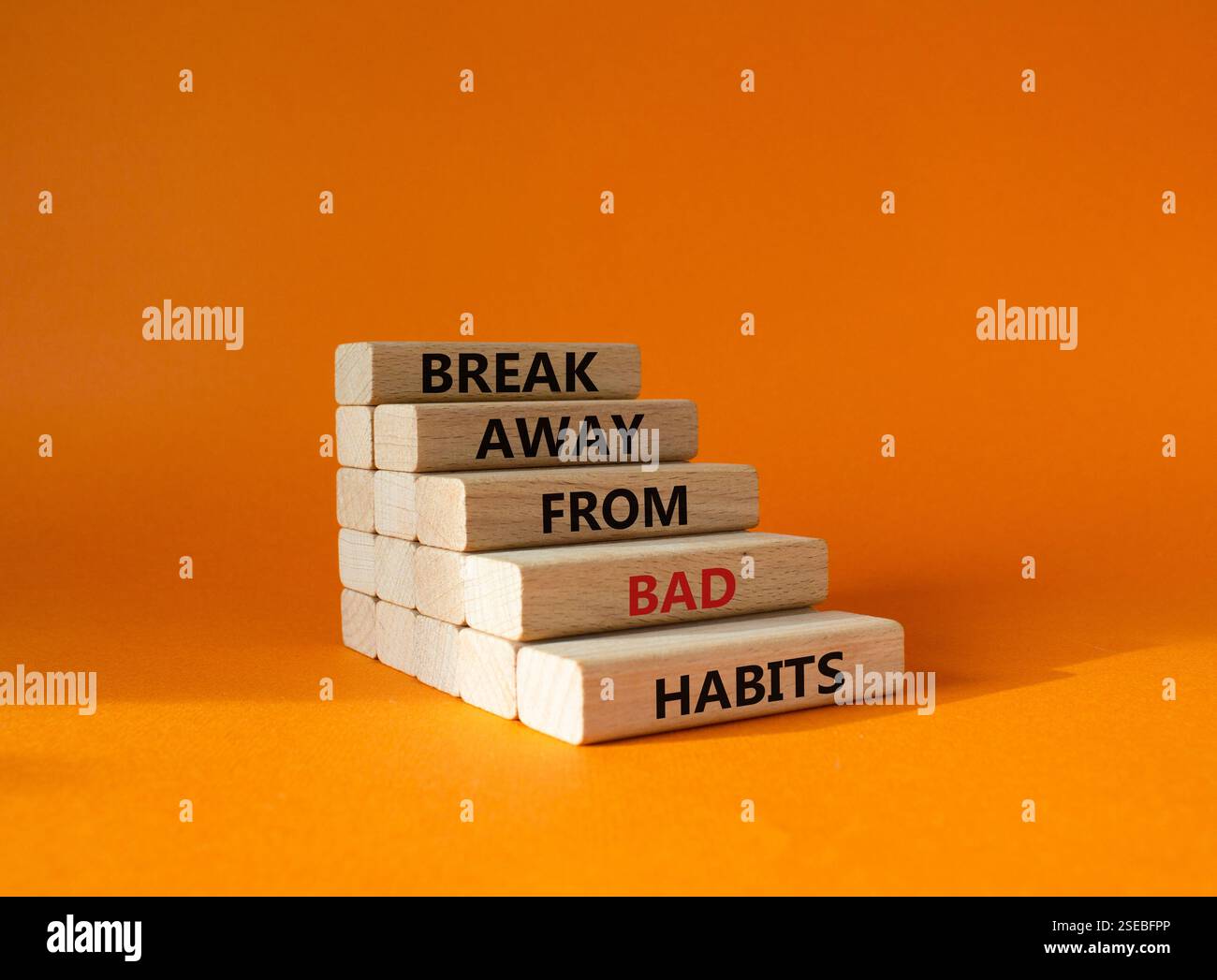 Break away from bad habits symbol. Wooden blocks with words Break away ...