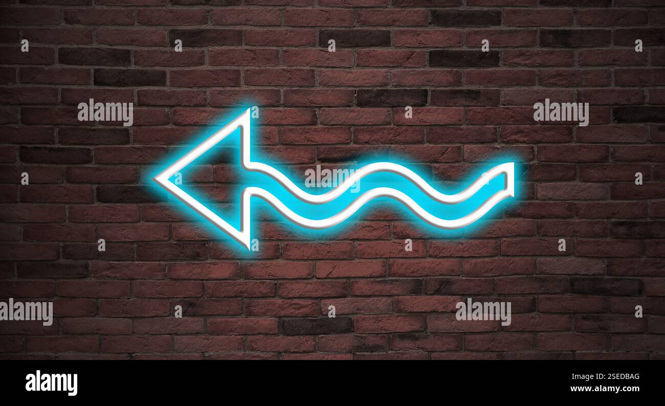 Bright neon arrow-shaped pointer on brick wall Stock Photo