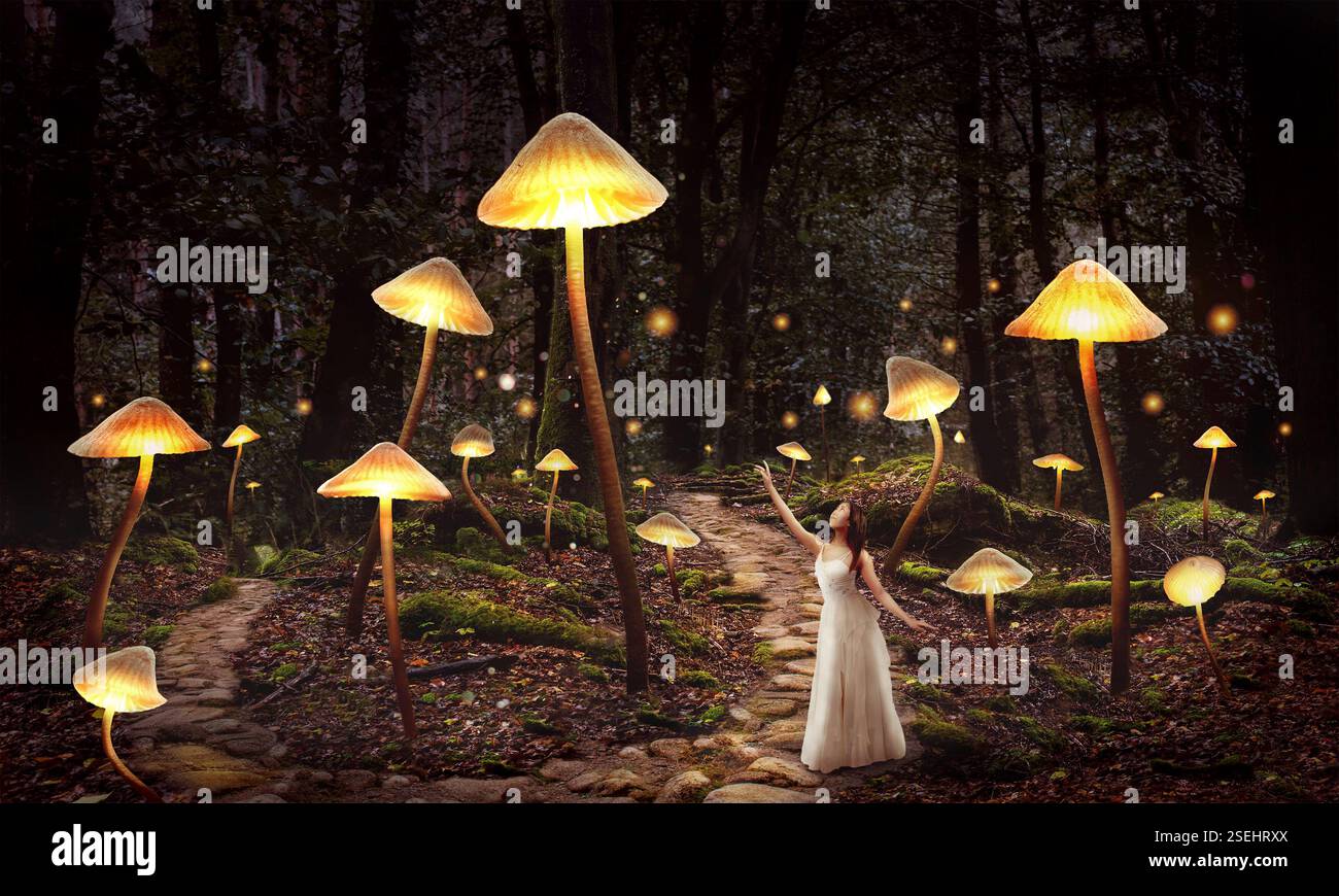 Girl in enchanted forest illuminated by magical glowing mushrooms in a ...