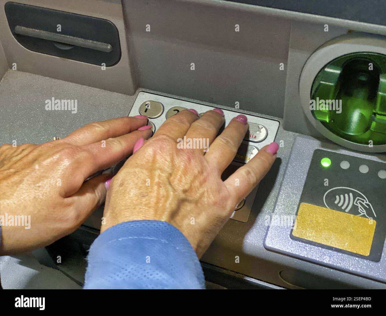 Women withdrawing money from hi res stock photography and images Alamy