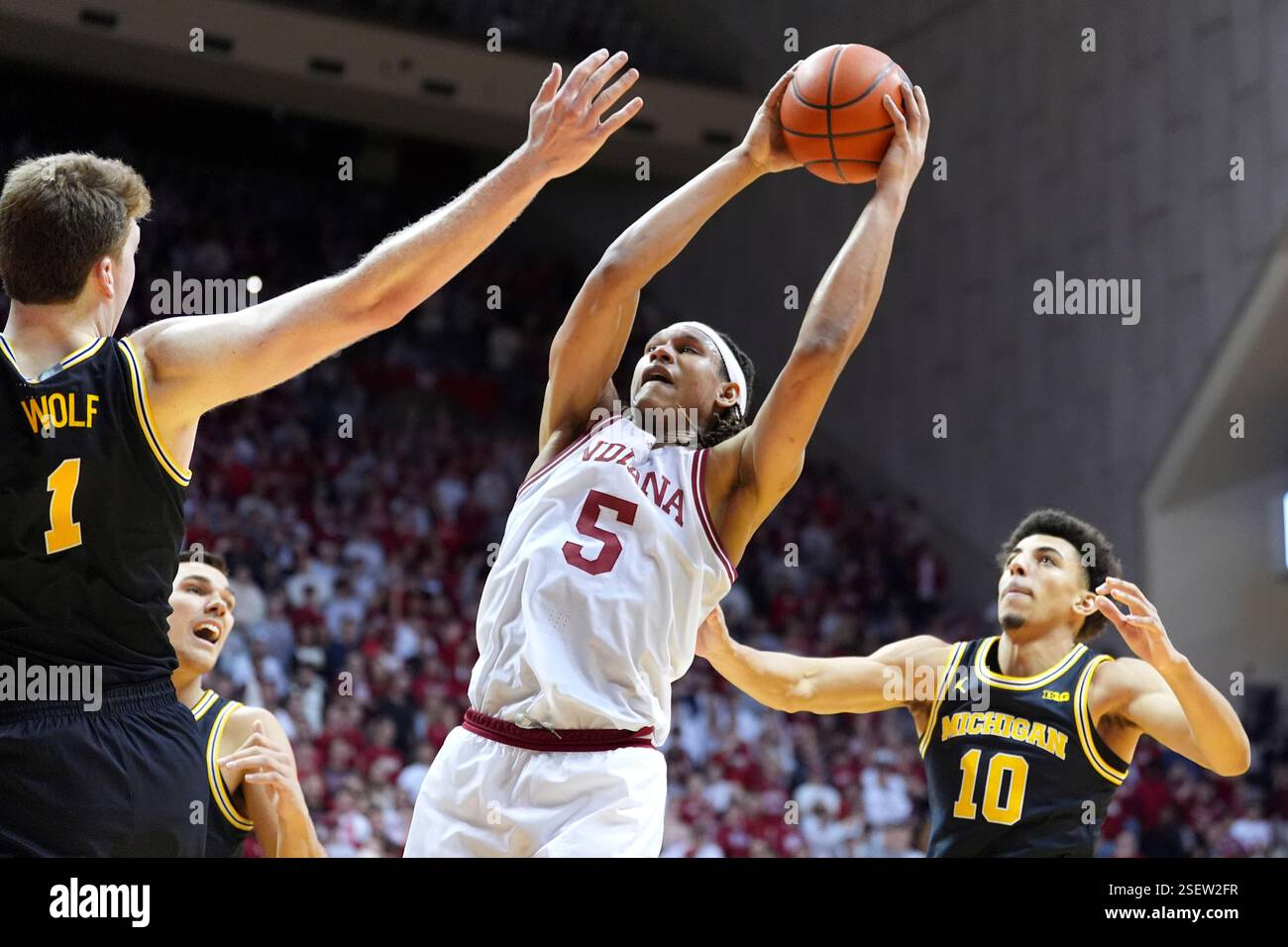 Indiana's Malik Reneau, center, rebounds the ball as Michigan's Danny ...