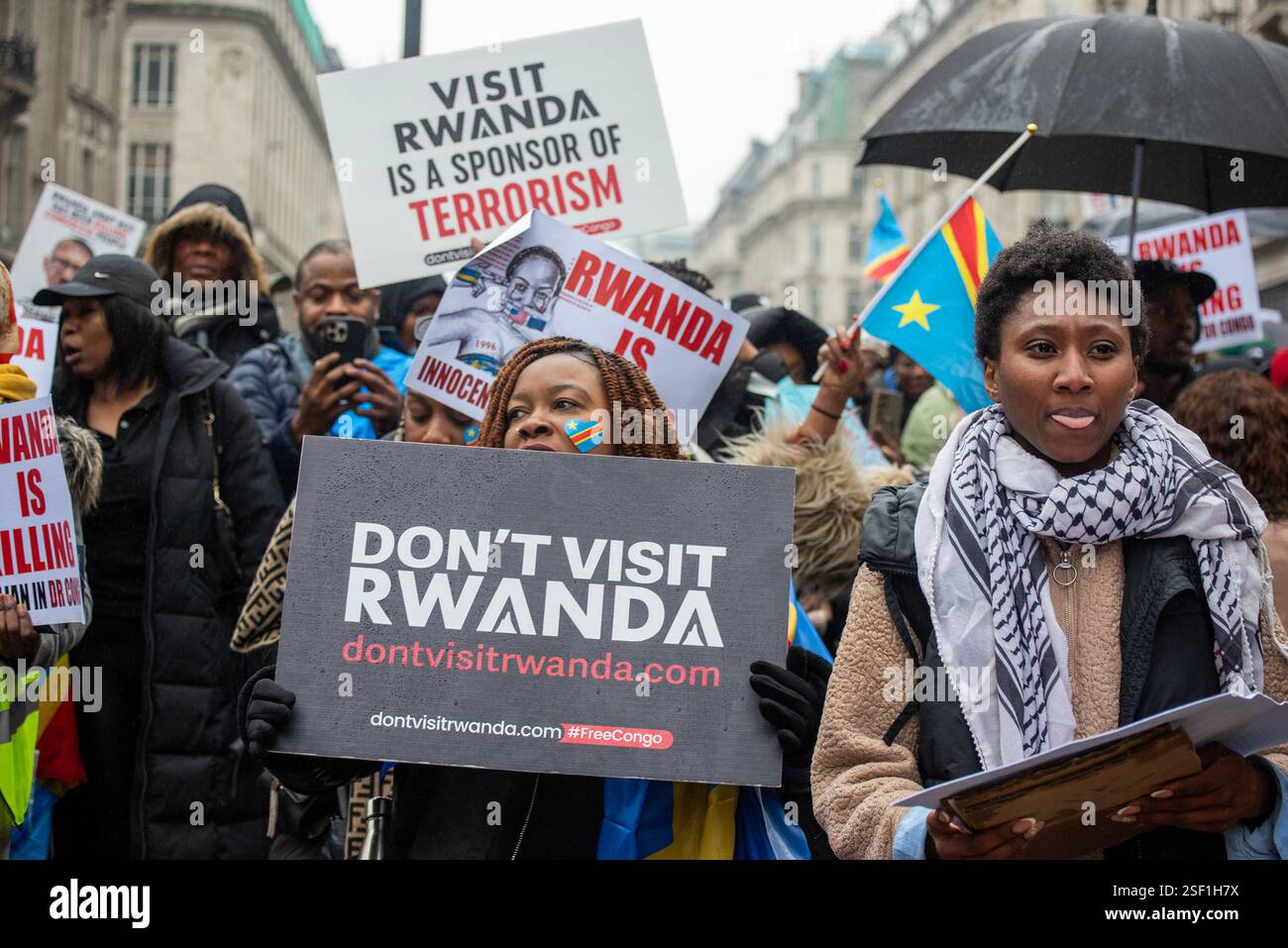 London Riot Rwandan London, UK. 08th Feb, 2025. Protesters walk with placards during the ...
