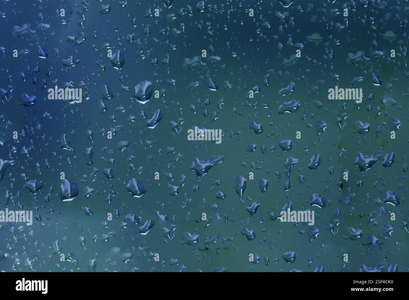 Natural blue water drop background on glass Stock Photo - Alamy