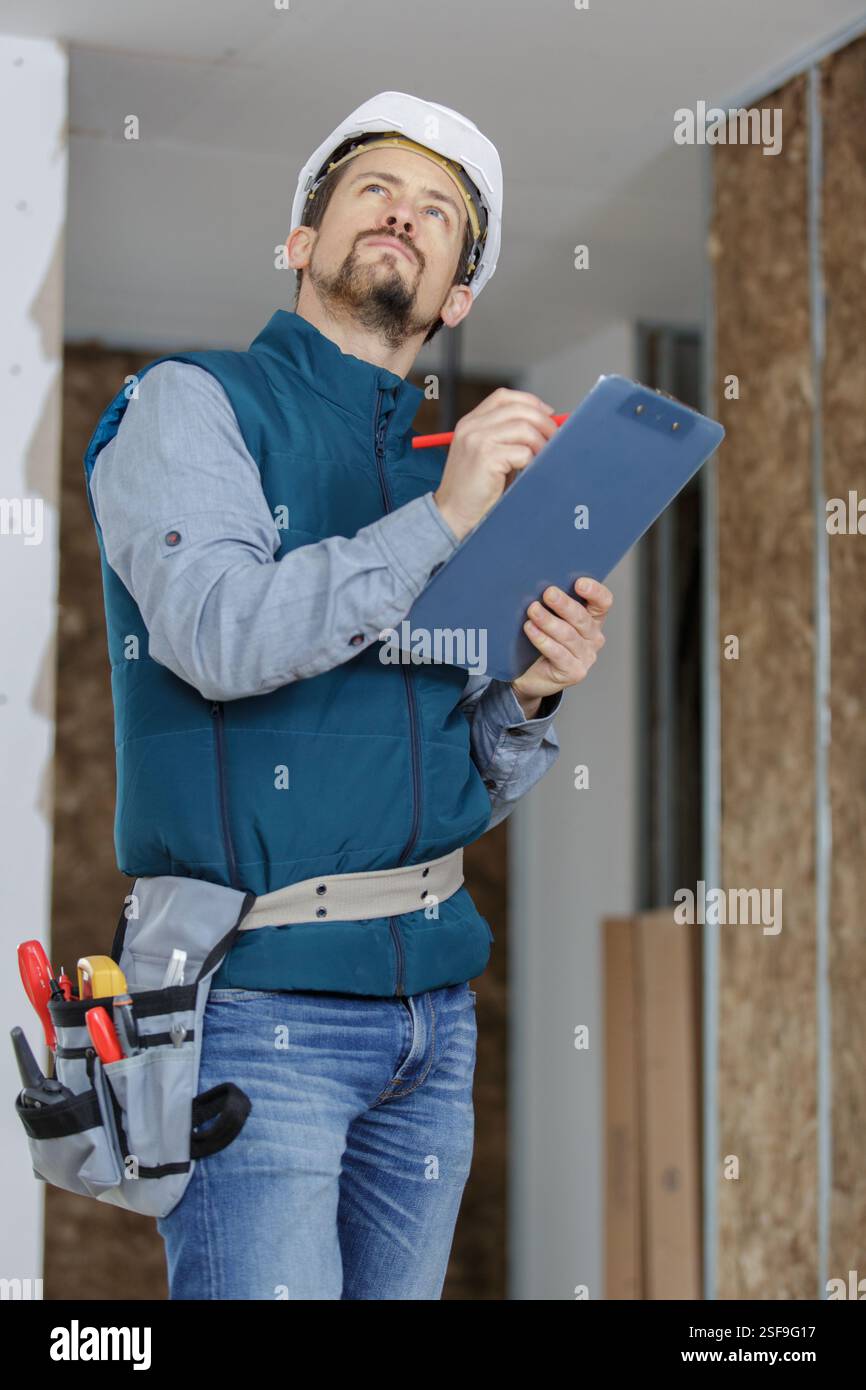 smart builder thinking about something Stock Photo