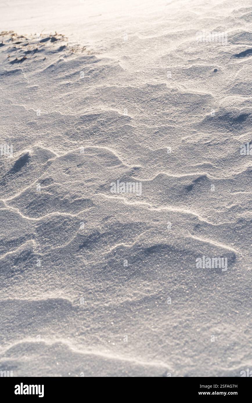 Shapes, textures, patterns created by snow and wind. Stock Photo