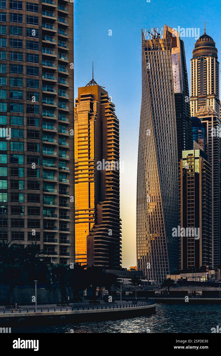 Waterfront skyscrapers in Dubai Marina at Sunset, Dubai, UAE Stock Photo