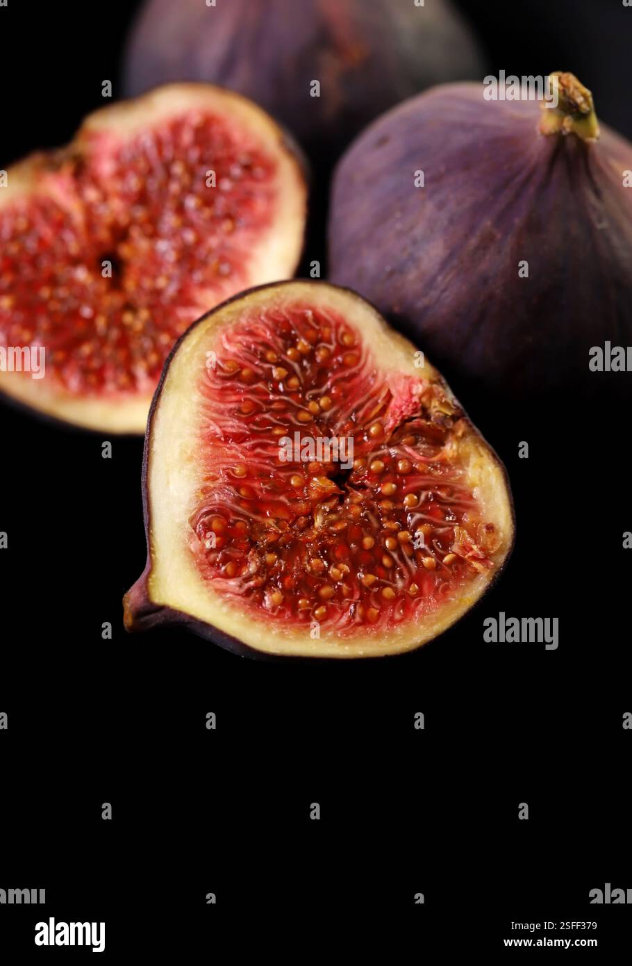 Fresh figs isolated on black Stock Photo