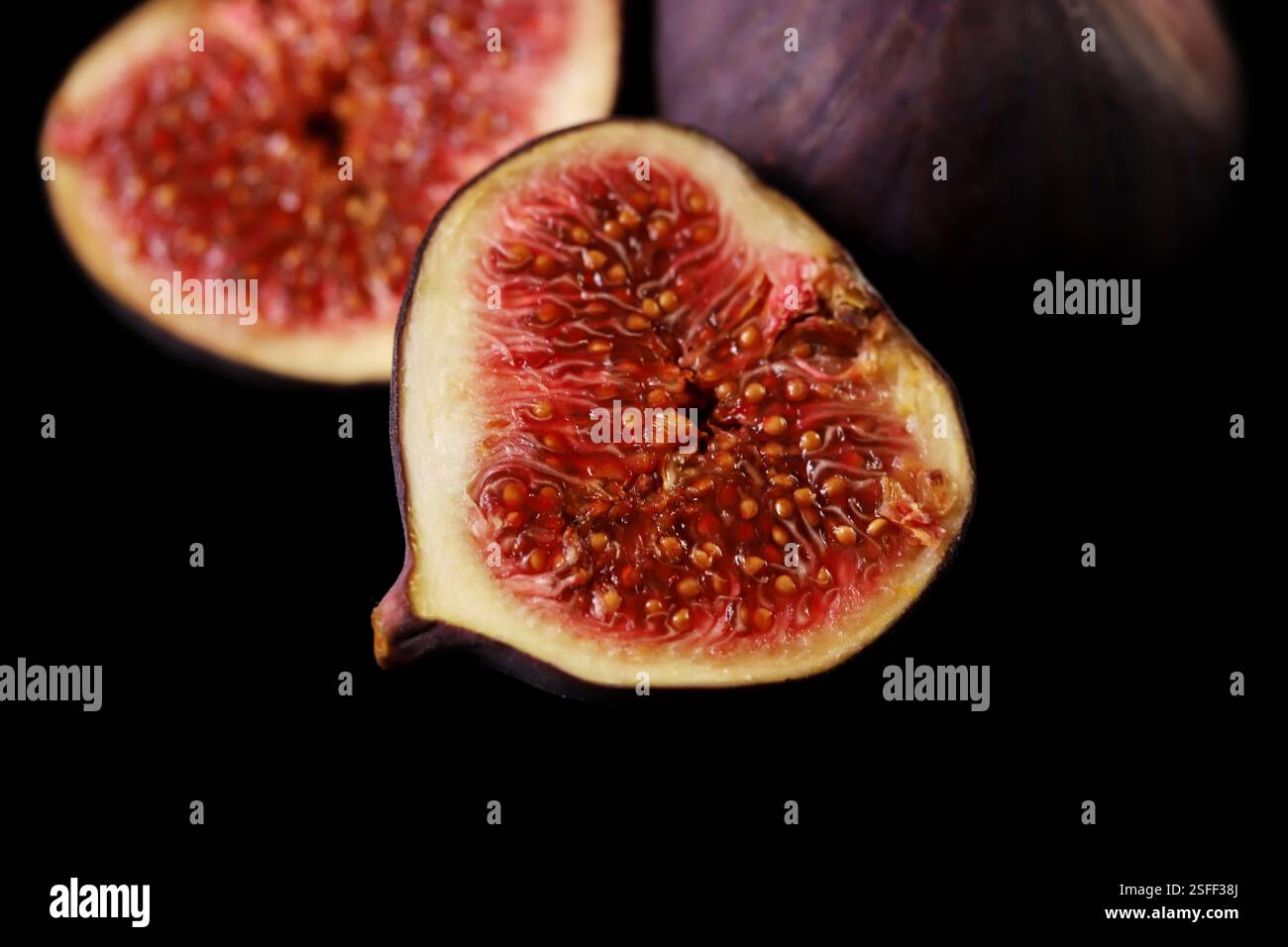 Fresh figs isolated on black Stock Photo