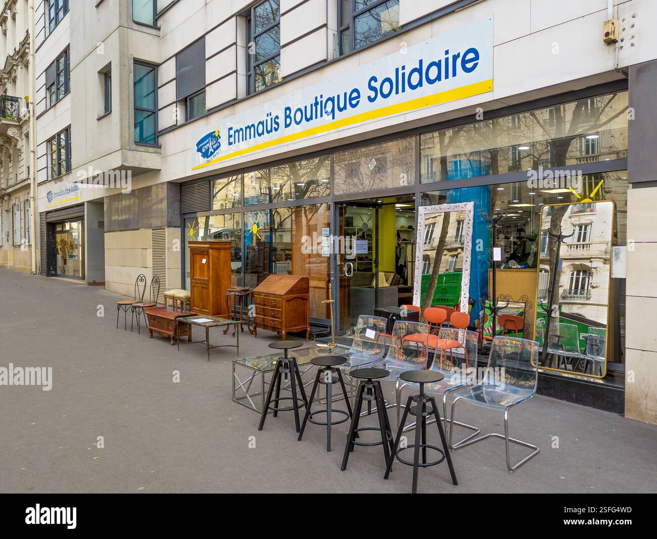 Exterior view of an Emmaüs solidarity store specializing in second hand. The Emmaüs movement is a group of associations and solidarity groups Stock Photo