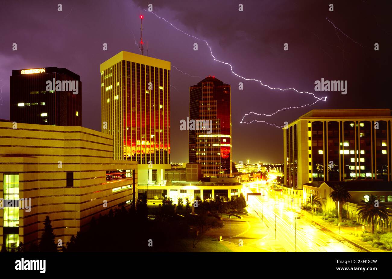 Lighting strike illuminates the sky over downtown Tucson, Arizona. Stock Photo