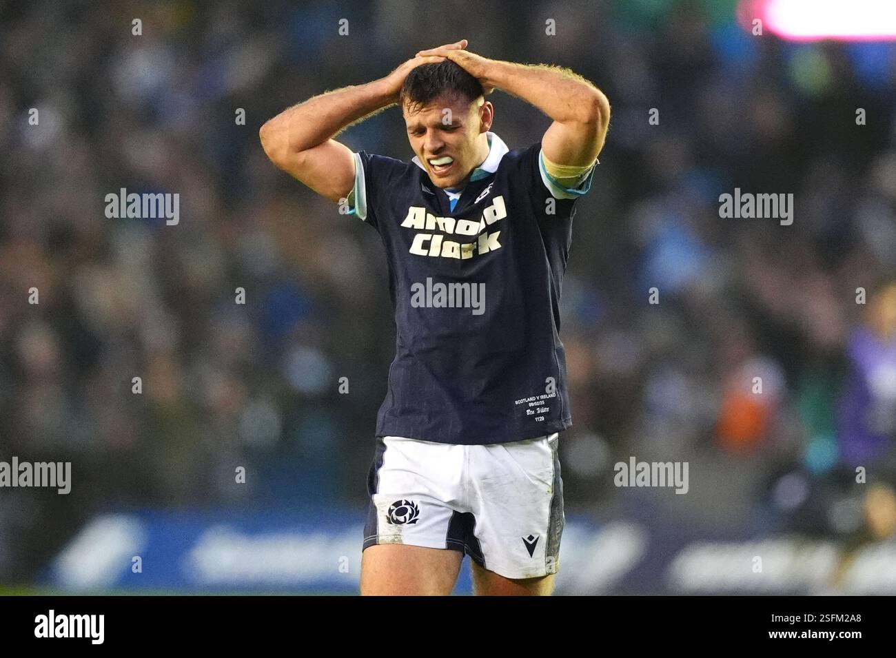 Scotland's Ben White reacts after scoring a try during the Guinness Men