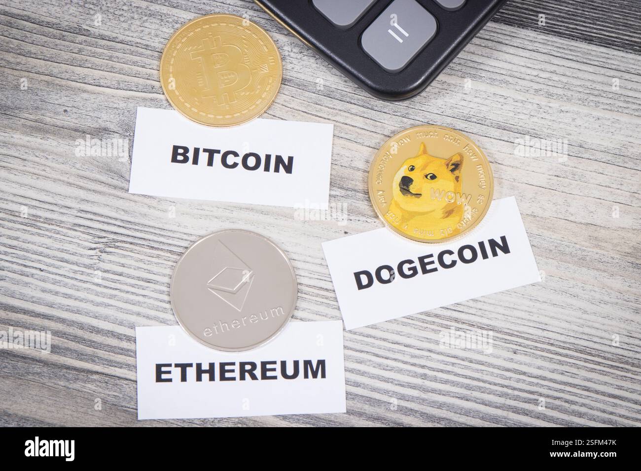 Bitcoin, ethereum, dogecoin and calculator. Cryptocurrency concept Stock  Photo - Alamy