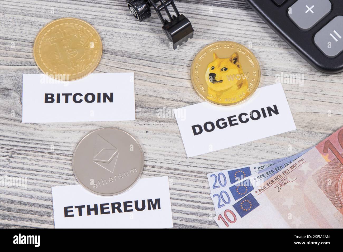 Bitcoin, ethereum, dogecoin and calculator. Cryptocurrency concept Stock  Photo - Alamy