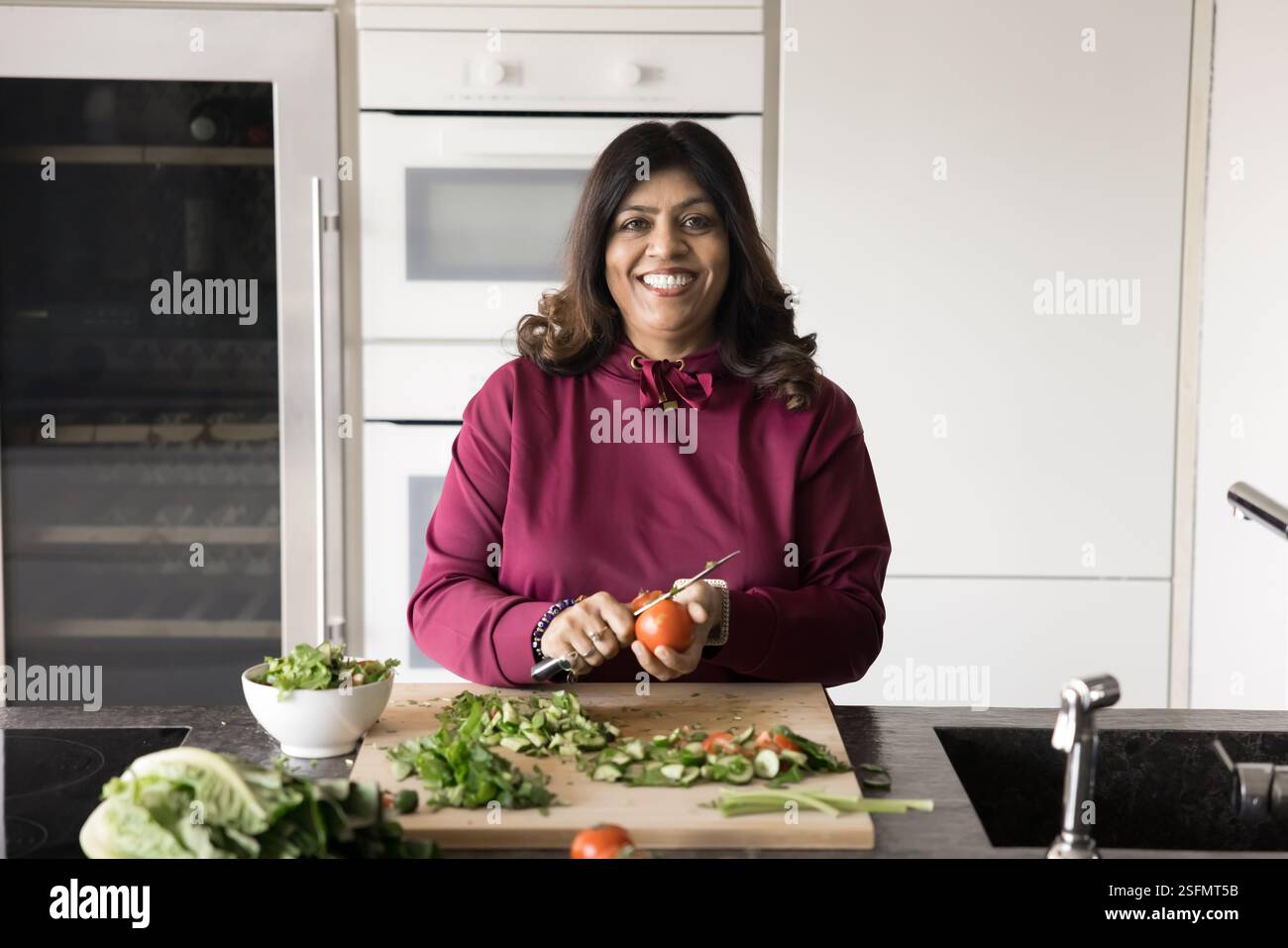 Indian mature woman hi-res stock photography and images - Alamy