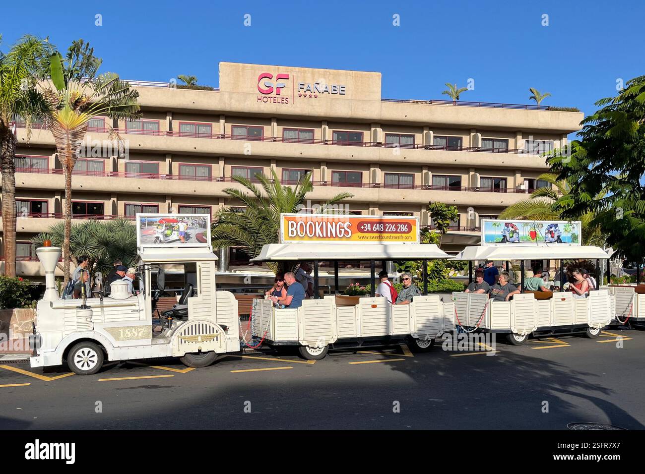 Land Train parked outside the GF Fanabe Hotel in Costa Adeje. Tenerife, Canary Islands, Spain. 16th January 2025. - Smartphone Captured Stock Image