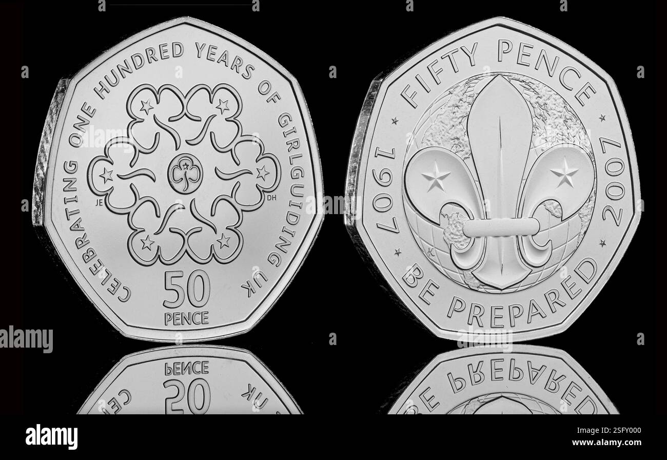 50p coins to commemorate 100 years of Girlguides & 100 years of Scouts Stock Photo