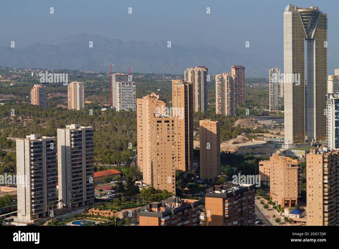 A panoramic view of a modern cityscape featuring tall buildings and ...