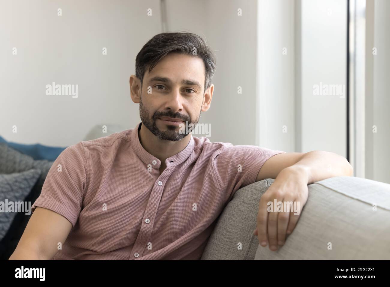 Middle-aged Portuguese man posing for camera with serious expression Stock Photo