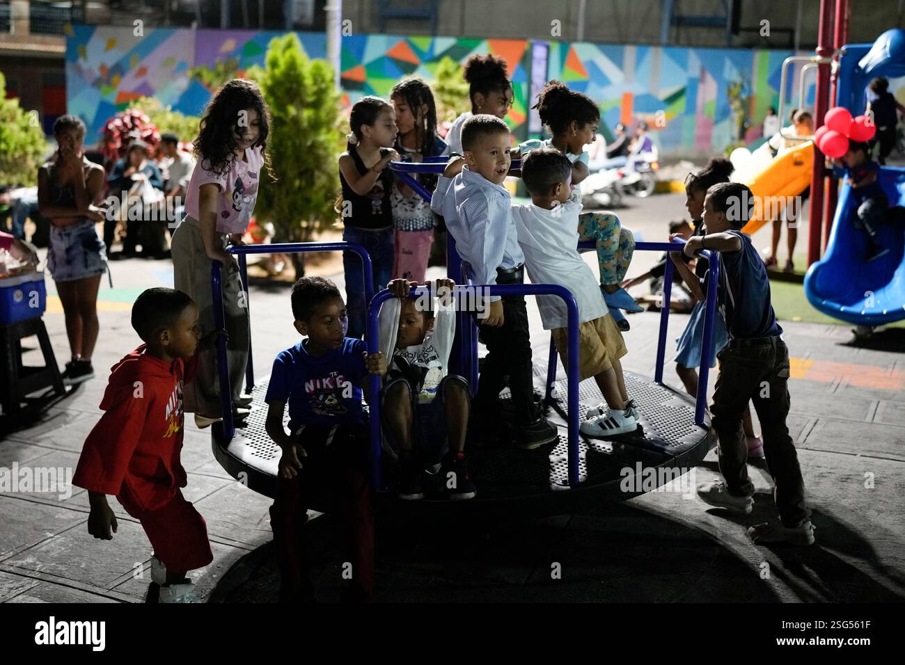 Children Play In A Public Park In The Petare Neighborhood Of Caracas children-play-in-a-public-park-in-the-petare-neighborhood-of-caracas
