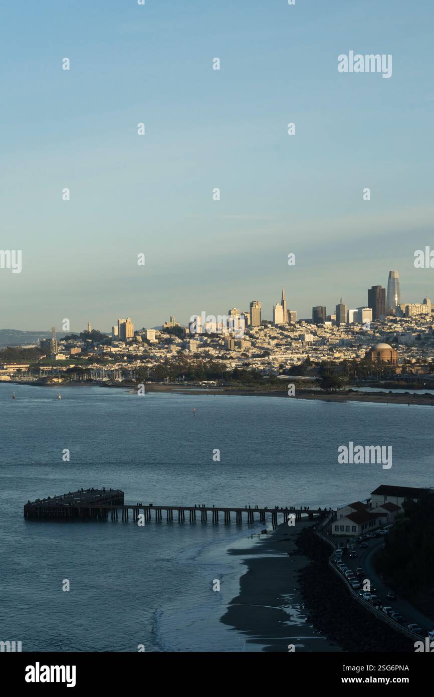 San Francisco skyline, Golden Gate Bridge visible in distance, pier ...