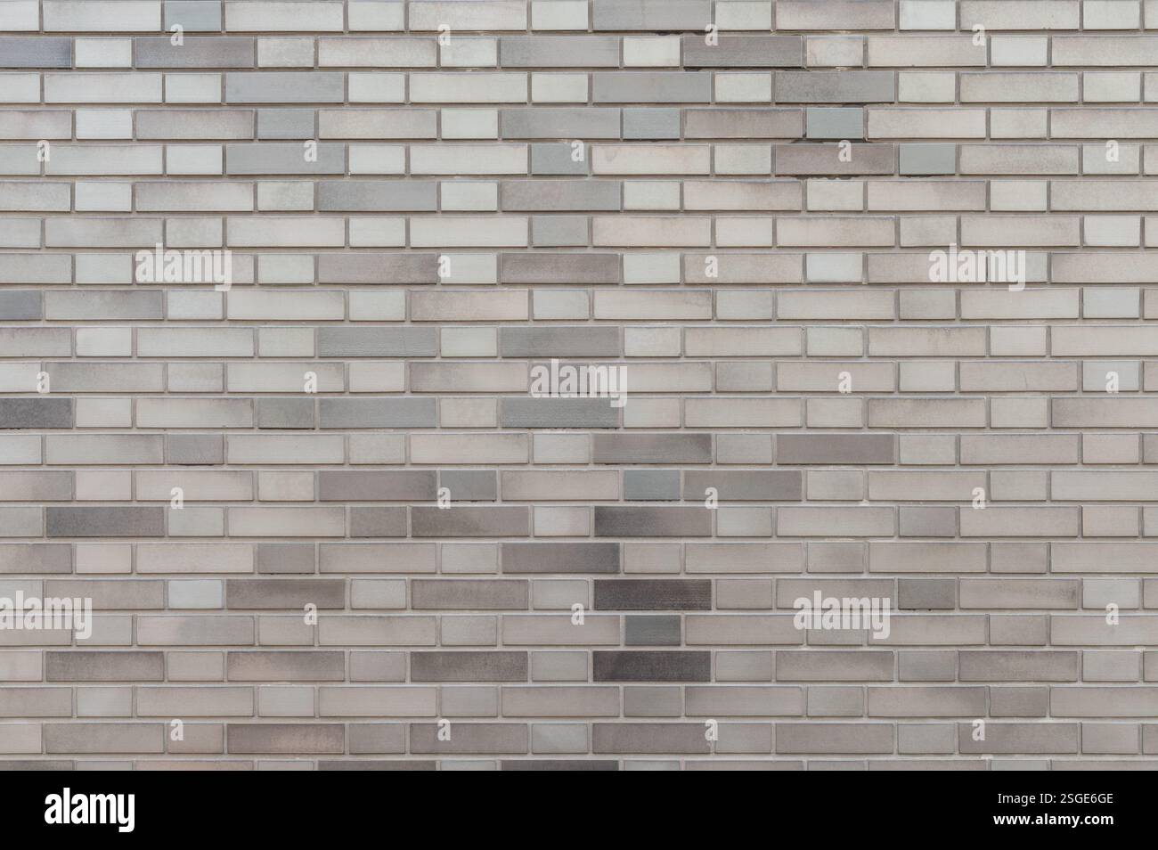 Gray tile brick wall background Stock Photo