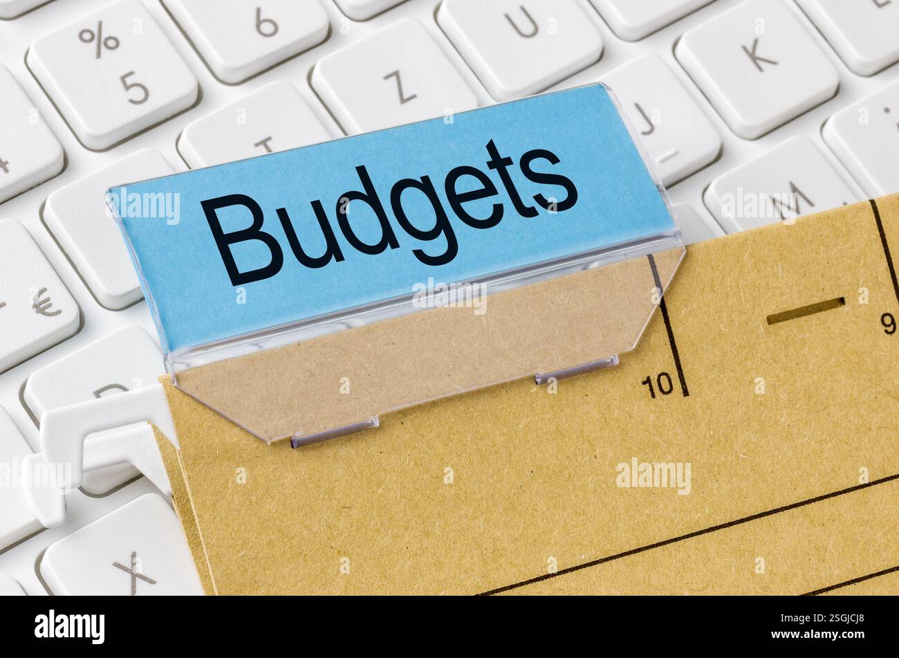 A brown file folder labeled with Budgets Stock Photo
