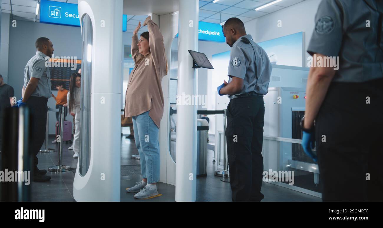 Security guard checkpoint detector checks hi-res stock photography and ...