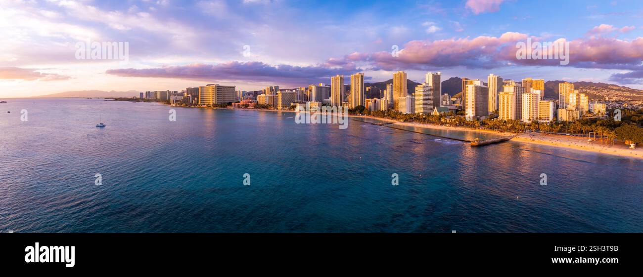 Aerial View of Waikiki Beach and Honolulu Skyline at Sunset Stock Photo ...