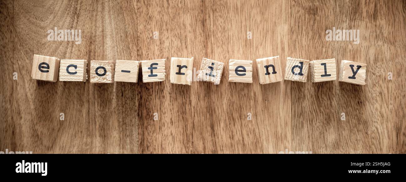 Wooden blocks display the term eco-friendly, highlighting the importance of sustainability and environmentally-conscious choices in modern living. Stock Photo