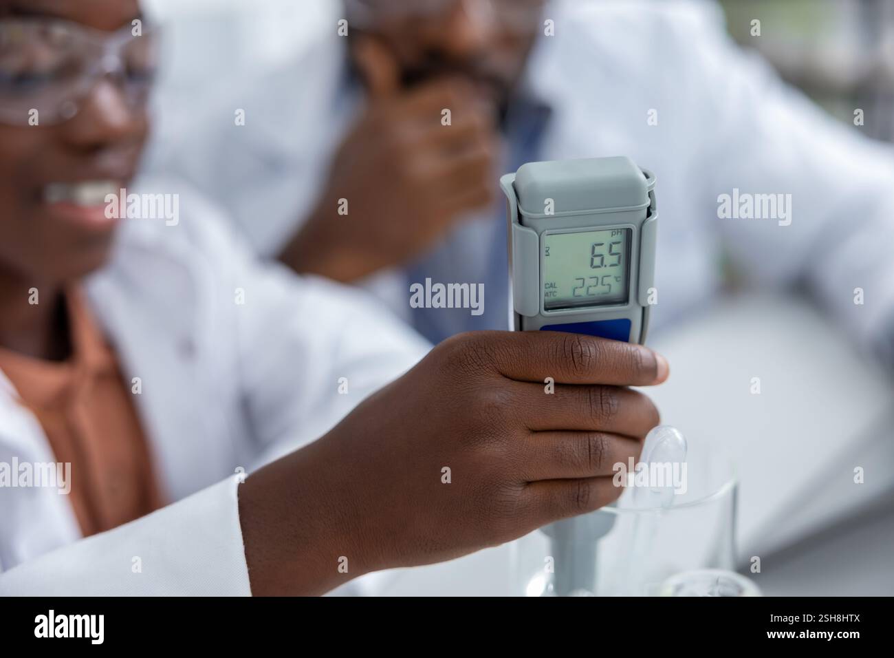 African american schoolgirl doing scientific experiments at the ...